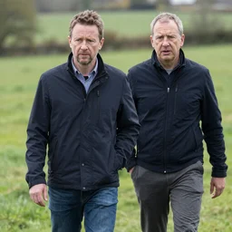 Ian Beale being stalked by noel Edmunds in a field in england
