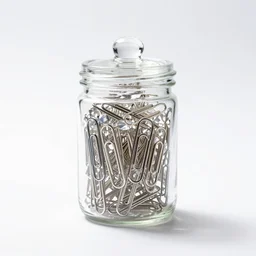 crystal paper clips jar, studio product photography, isolated on a pure white background, centered, entire object in frame, sharp focus, soft studio lighting