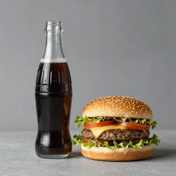 studio photograph glass bottle soda and a hamburger
