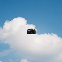 camera pointed at the sky, bright blue sky, fluffy nice clouds, nostalgic album cover, no text