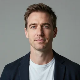portrait of a forty two year old british man with slim features feeling contentment