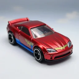 3 5 mm photo of metallic red and blue wonder woman car like hot wheels model with a sky as background, epic cinematic, epic lighting