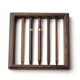 antique calligraphy set, 8k product photo, isolated on a pure white background, centered, entire object in frame, sharp focus, soft studio lighting