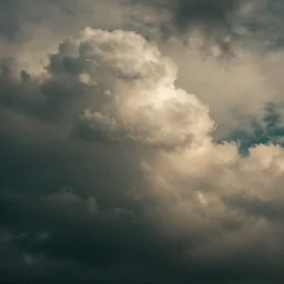 a cinematic shot of turbulent clouds. hyperrealistic. dramatic lighting. sepia and dark teal. trending on artstation