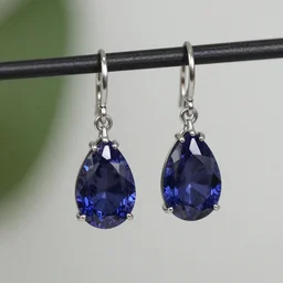 a pair of tear drop sapphire earrings
