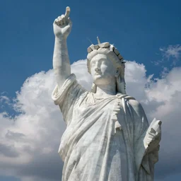 white cloud and blue sky in the shape of a large statue