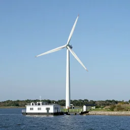 a modern white offshore windmill that is also a habitat for people to live on the windmill. There is also a houseboat on the water that connects to the windmill -i -n4 -s50