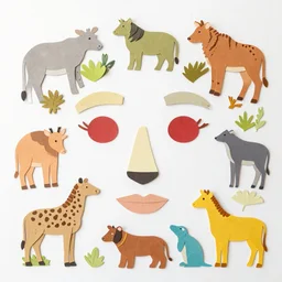 a face made of cut - outs of animals