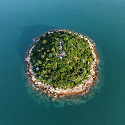 dreamy aerial view of a secluded island, highly detailed, drone photography, landscape photography, photorealism, smooth 4k