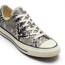 snakeskin converse sneaker on a white surface, clean 3 d render, beautiful studio lighting, soft, sharp focus, intricate detail, art by iris van herpen