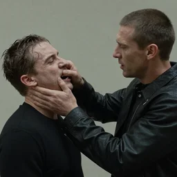 Rick Owens gets punched in the face, photorealism, film still