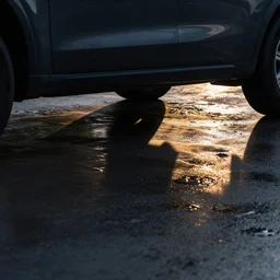 reflection in water if a car