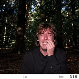 trailcam footage of young Paul McCartney crying in woods at night