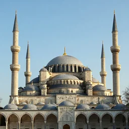 An old mosque with huge dome and tall minarets,