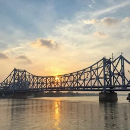 howrah bridge, calcutta, sunset,  illustration, art by alphonse mucha and tian zi and WLOP