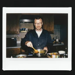 35mm polaroid of walter white cooking, photography