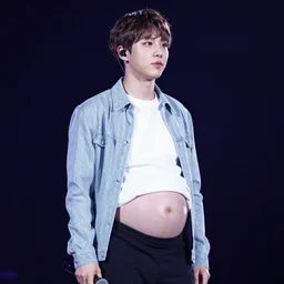 Photograph of pregnant Jeon Jungkook on stage