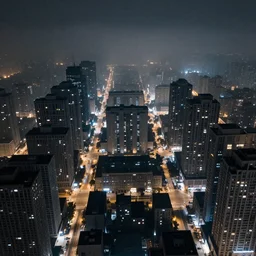 Birds eye view of an oppressive industrial city at night, pollution, foggy, rectangular city grid with very narrow streets, few streets, tall brutalist architecture buildings with very few windows, all buildings with the same height, city lights spilling upwards above the top of the buildings, digital art,