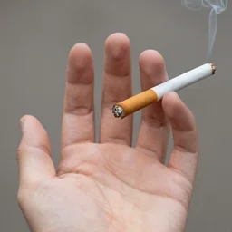 Close-up of thin soft hand, long cigarette with smoke, hand with five fingers, hyper realistic, high details, photo, super resolution