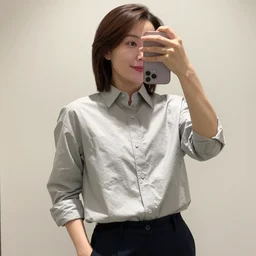 Woman wearing a Y-3 button up, iPhone photo, selfie