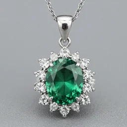 a 2kt emerald pendant with diamonds in the shape of a star,