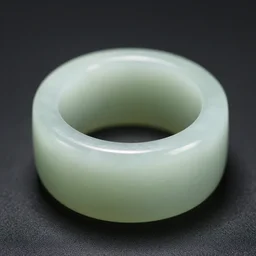 close-up photograph of a jade ring, incredibly detailed, studio lighting, 50mm lens