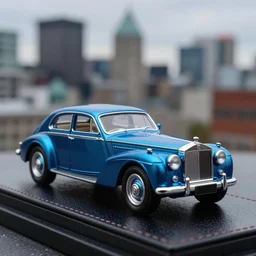 3 5 mm photo of metallic blue 1 9 9 9 rolls royce boat tail, like die cast 1 / 6 4 model with a blur montreal city as background, epic cinematic, epic lighting