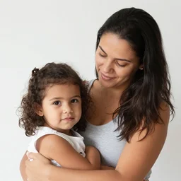 a portrait photograph of young, caring, 3 5 year brazilian mother, canon 8 5 mm f 1. 2 photograph