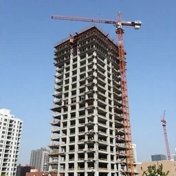 demolition of a skyscraper in progress