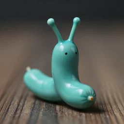 a small turquoise sausage - shaped creature with two elongated stick - like heads from the front of its body