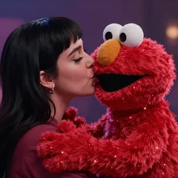 katy perry kissing elmo, soft surface texture, photo, soft led lights, 4 k, high detailed photography result, 5 0 mm lens, rich deep colors, smooth gradients, depth of field, cinematic, hyper realism, high detail, octane render, unreal engine 5, 8 k, vibrant colors