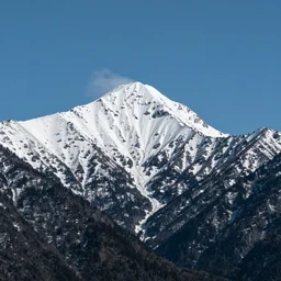 a mountain with snow