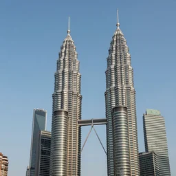 sideways Twin Towers collapse horizontally in the cloudless Tuesday sky