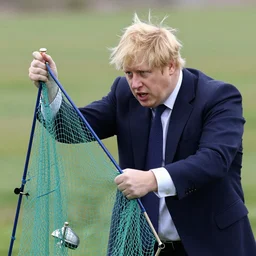 boris johnson caught in a fishing net, struggling, photo