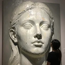 looking up at a gigantic three - dimensional thick impasto oil painting in the shape of a woman's head, with blank shut oil paint encrusted eyes, lots of thick encrusted paint, wet paint is oozing down over the face like wax on a candle, no skin or hair, or frame visible, lit from right