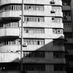 an approaching shadow, photorealistic, brutalist, natural light, black and white, hong kong 1 9 5 4