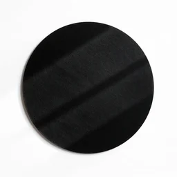 a single black circle on a white background
