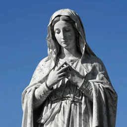 high contrast monochrome virgin mary in blue sky
