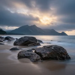 landscape photography, beach with rocks, morning, dramatic lighting, mountains, clouds, beautiful