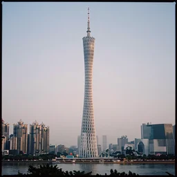 kodak portra 4 0 0 photo of detailed tower of guangzhou, with waterfalls and river, diffuse lighting, ultra detailed, sharp, intricate, elegant golden hour, wide angle, 3 5 mm, sharp focus, soft light, volumetric light, trending on pinterest, in the style of gregory crewdson and thomas kinkade, masterpiece