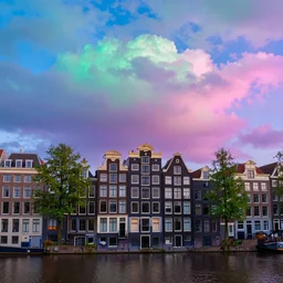 amsterdam with psychedelic clouds in the year 2 1 4 5. 4 k blue purple pink green
