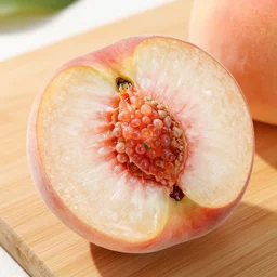 a delicious ripe peach is cut open on a cutting board, a beautiful large peach color diamond instead of a pit, 8 k, 4 k, high quality