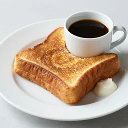 French toast a cup of coffee with milk beside of the plate, Michelin star, award winning