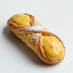 photo of a mustard cannoli, award winning, 8 k, photorealistic