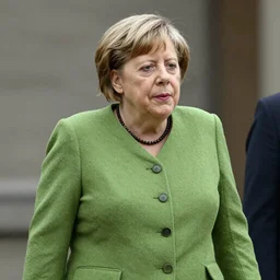 angela merkel as a lizardman, realistic