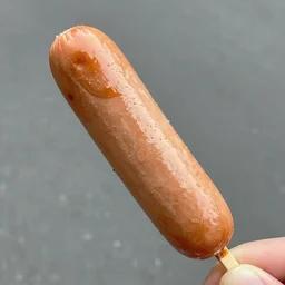 hot yogurt trips from the tip of a frankfurter