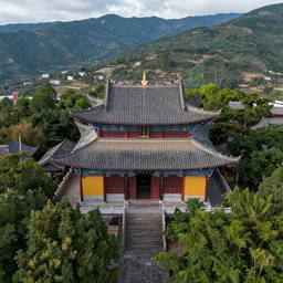 top down view of traditional chinese temple in yunnan, seen from above, surrounded by mountains and forest, by christophe vacher