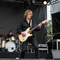 Jimmy Page playing guitar with Adam Jones on large outdoor stage, high def, 8k