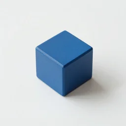 blue cube top down view on white table