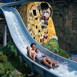 laughing!!!!!!!!!!!!!!!!!!! and sliding down a huge water slide at edge of the world by waterhouse, craig mullins, ruan jia, gustave klimt